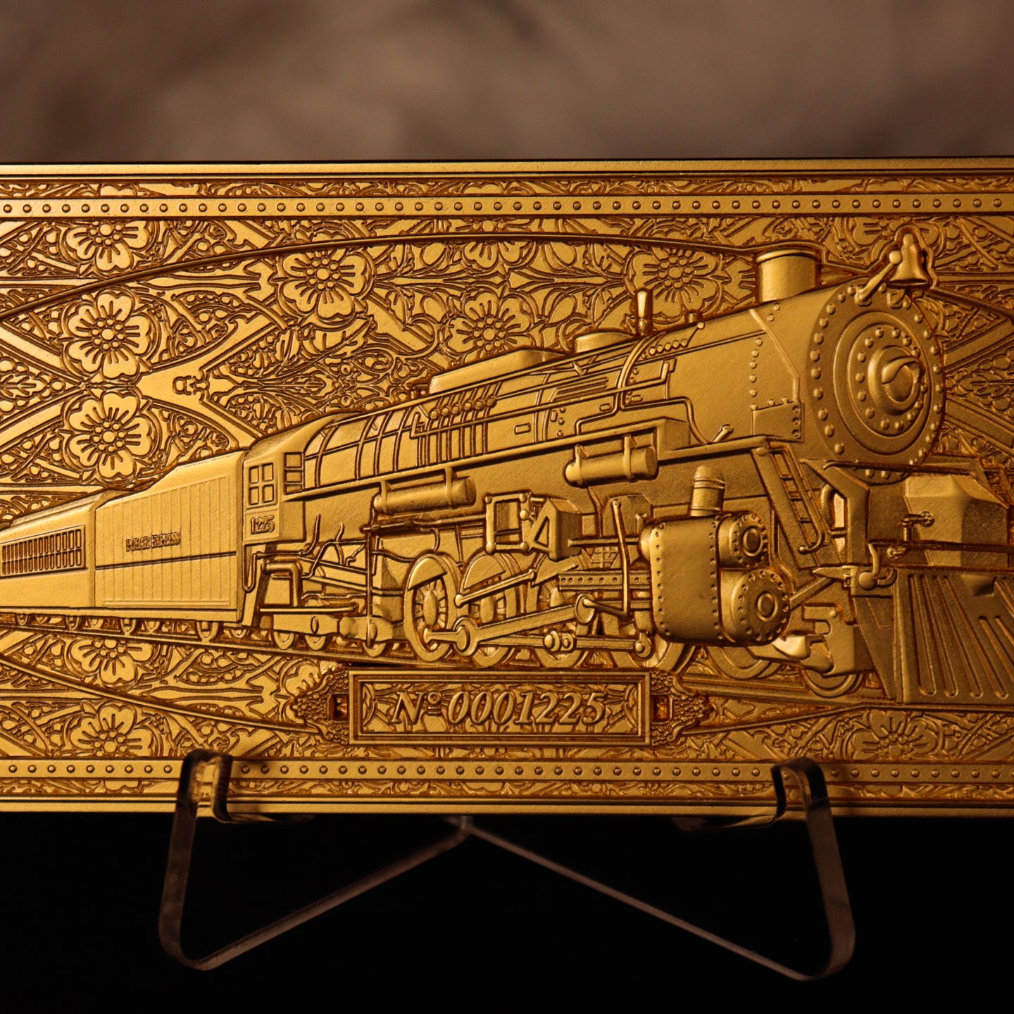 The Polar Express 24k Gold Plated Train Ticket Front Lifestyle Shot with Acrylic Stand 